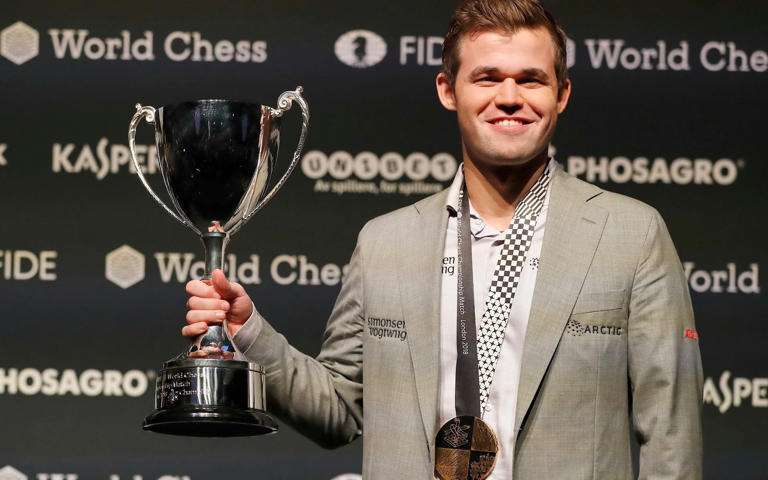 Chess-Carlsen may not defend world title due to lack of motivation